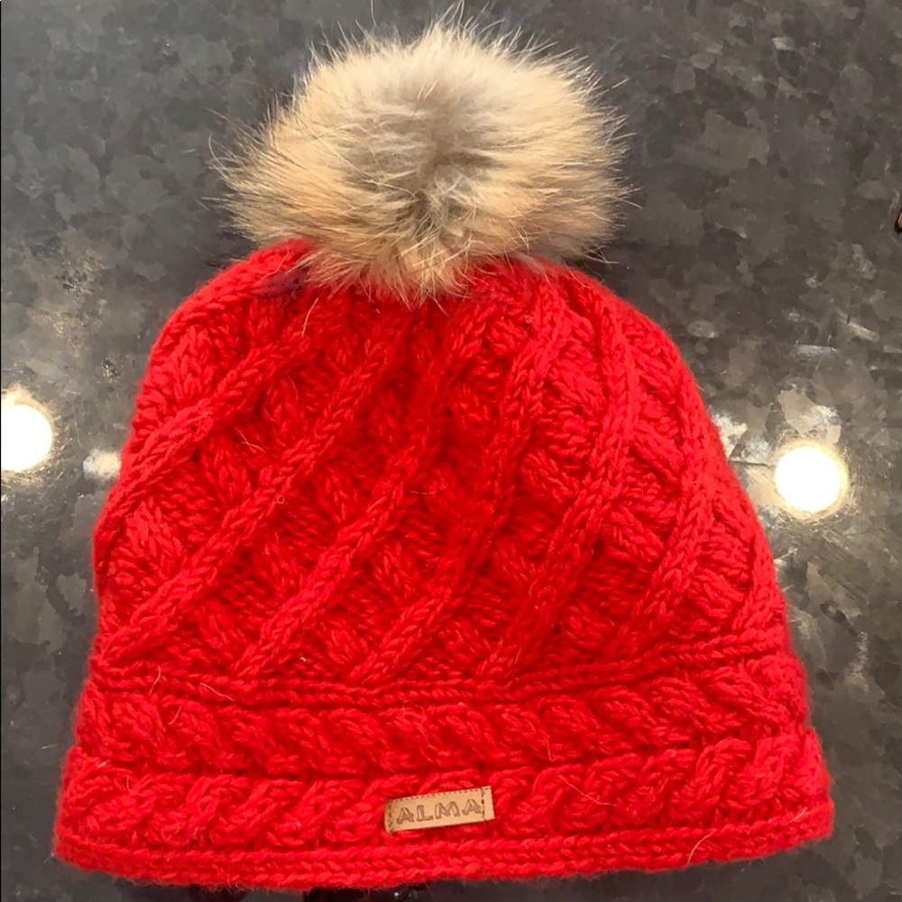 Red hand made wool hat with Pom pom